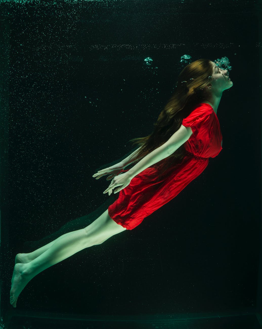 woman wearing red dress