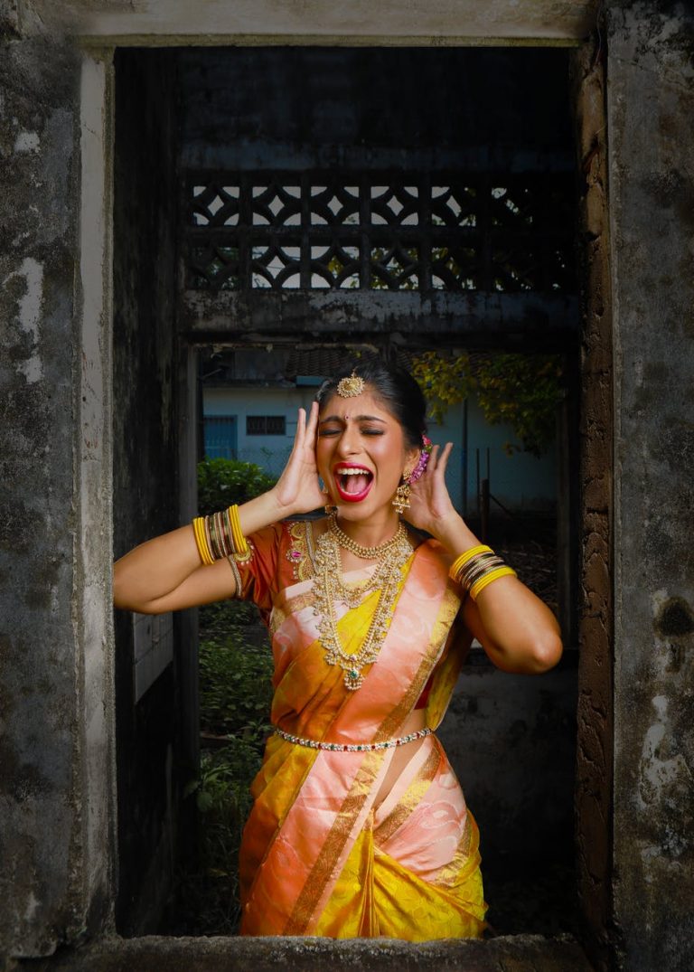 woman in yellow and orange sari dress